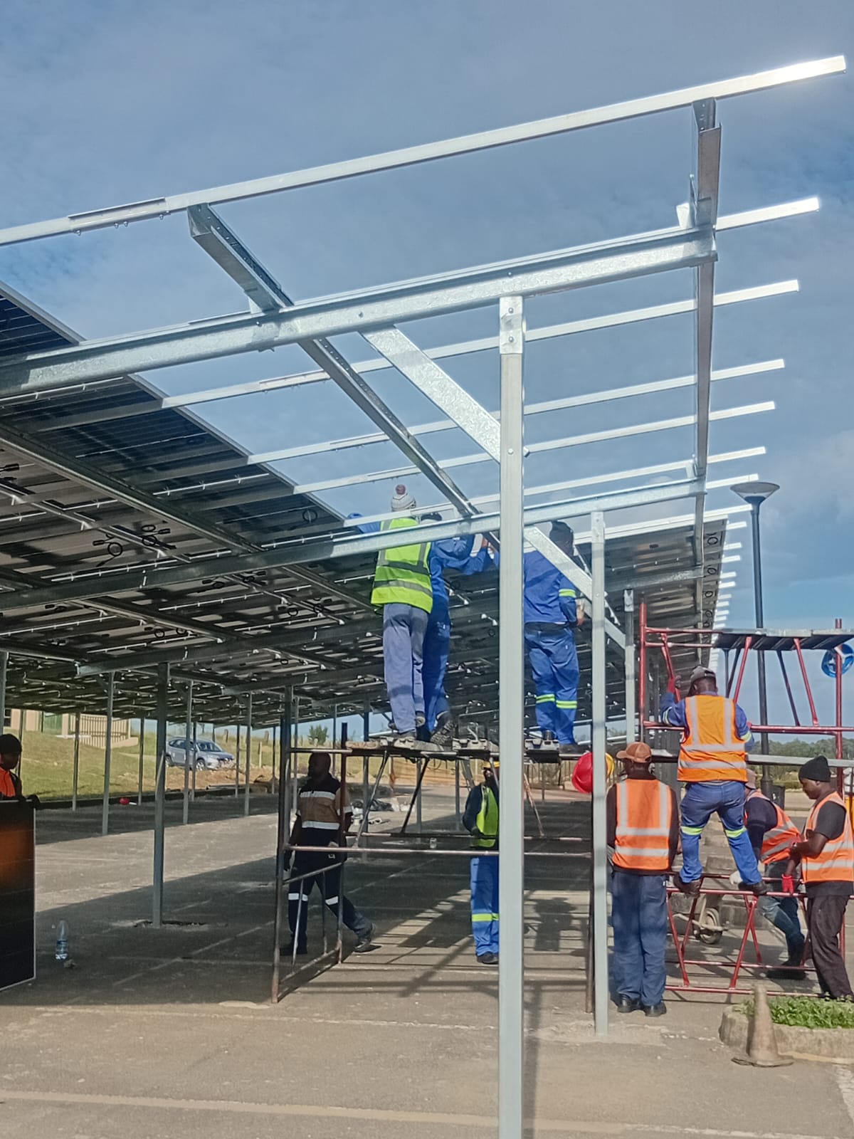 Stonegrid engineer working on a solar installation